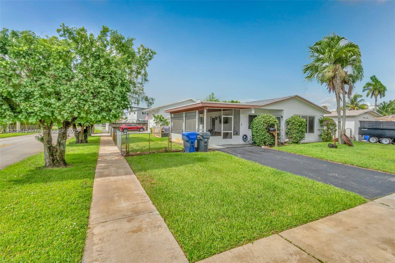 Charming 3 bedroom, 2 bath one story home on a desirable corner lot.