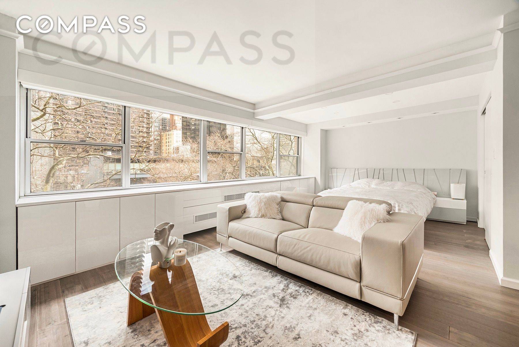 Welcome home to this meticulously renovated oversized alcove studio offering unparalleled comfort and style, complete with breathtaking open views of Dag Hammarskjo ld Plaza.