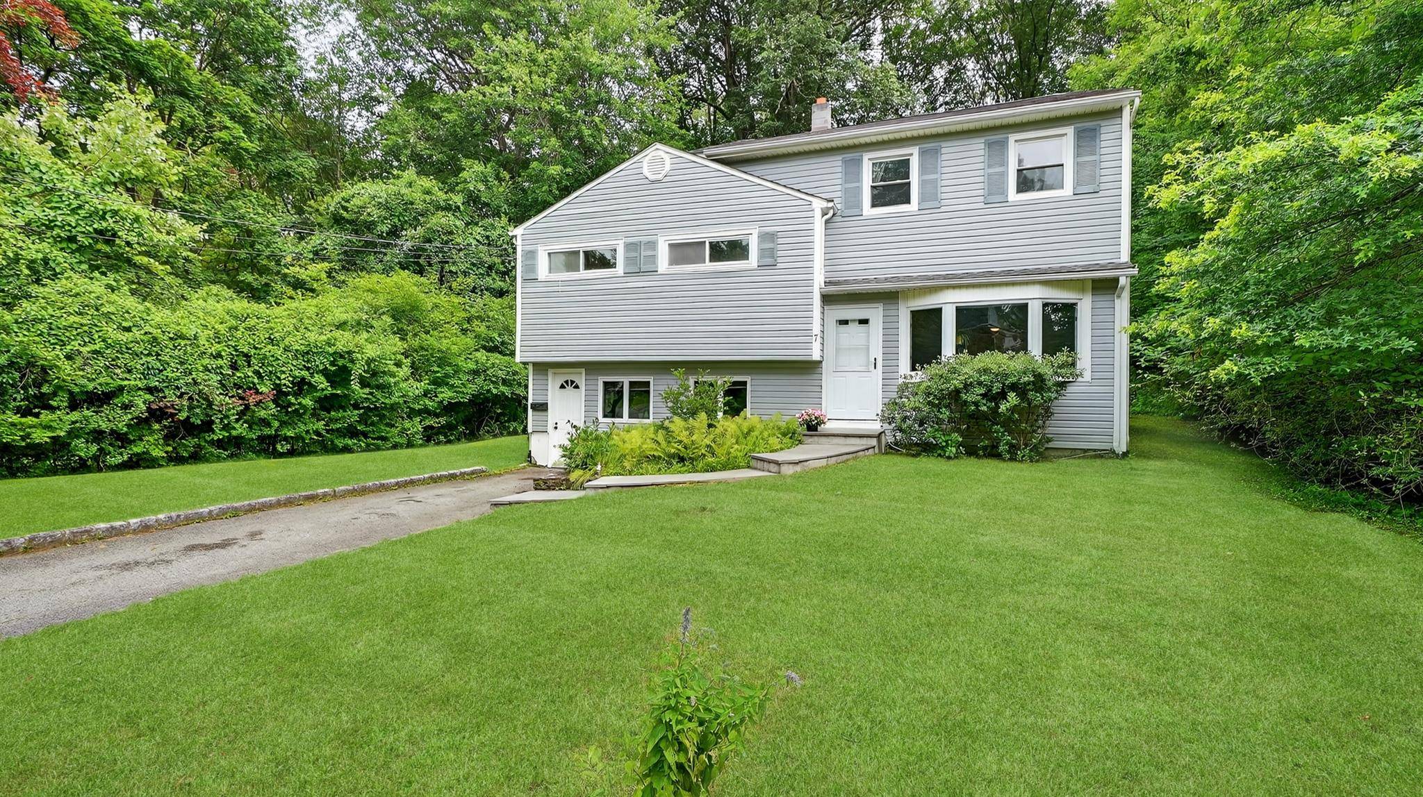 Welcome to this spacious and updated split level gem, perfectly positioned on a quiet cul de sac.