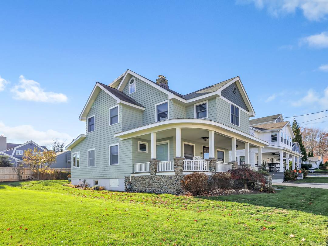 Coastal living at its finest in this beautifully updated 3 4 bedroom, 2 1 2 bath Colonial Craftsman, ideally located just two homes in from the water in the highly ...