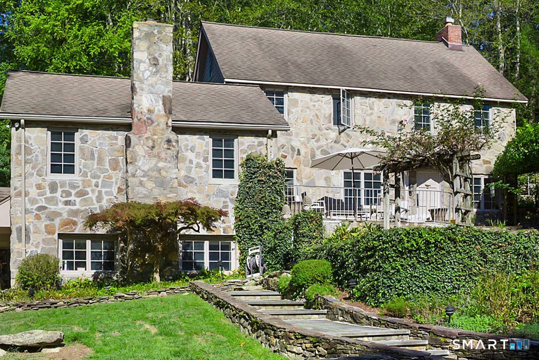 A rare offering in Westport, this antique stone home blending timeless character with modern updates.