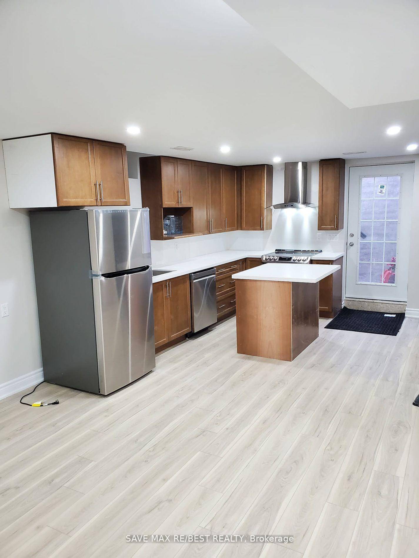 Modern 2 Bedroom with large windows, legal basement with Separate side entrance available for Rent in Brampton.