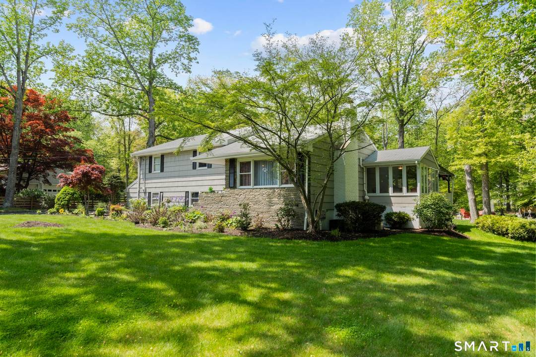 Nestled in one of West Norwalk's most desirable neighborhoods, this spacious split level home offers the perfect blend of comfort, flexibility, and privacy.