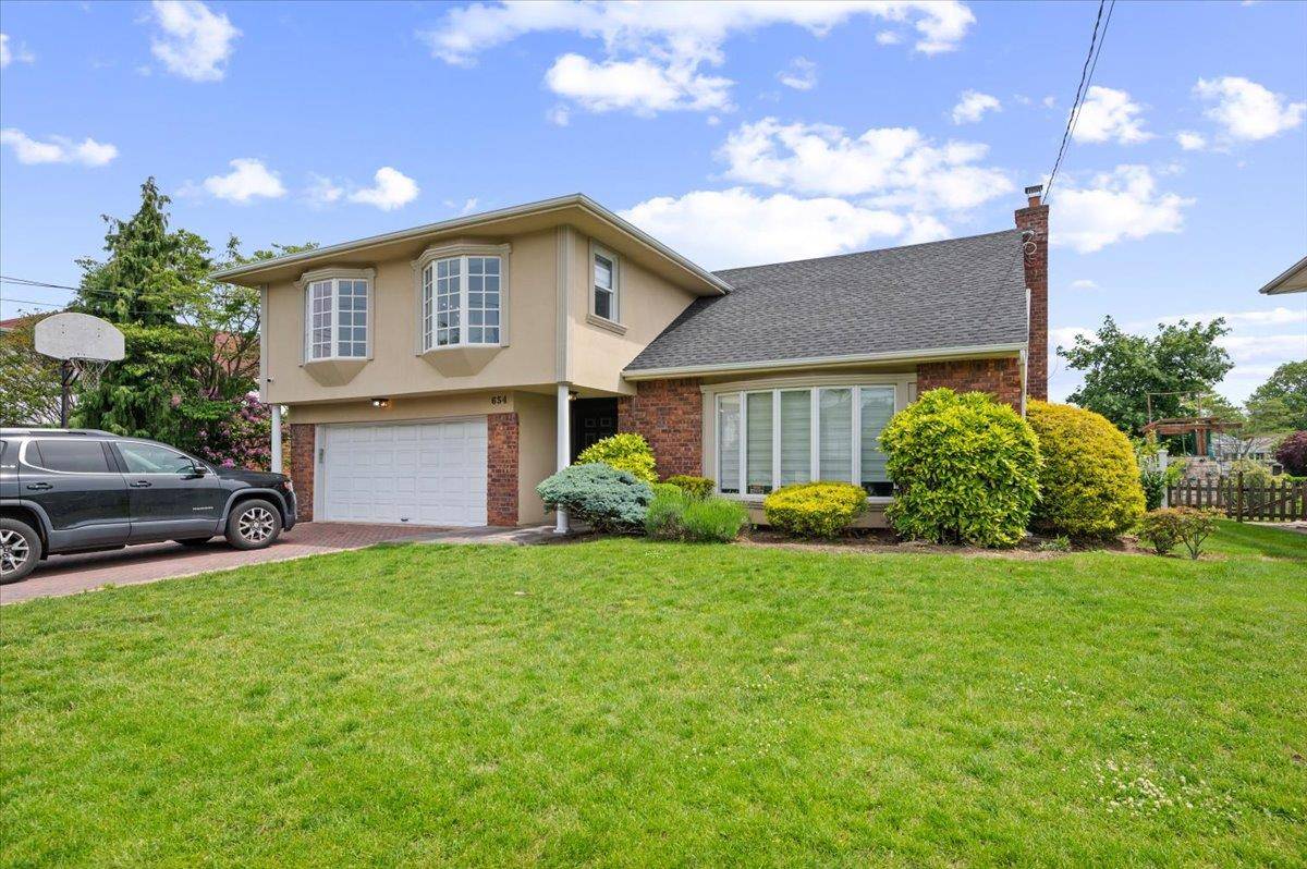 Stunning Multi Level Home with Breathtaking Water Views Welcome to this beautifully updated, move in ready gem featuring four spacious bedrooms all on one convenient level.