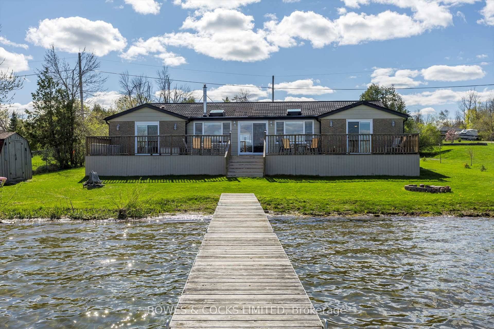 Nestled along the tranquil shores of picturesque Chemong Lake, this stunning waterfront bungalow offers the perfect blend of peaceful living amp ; refined comfort.