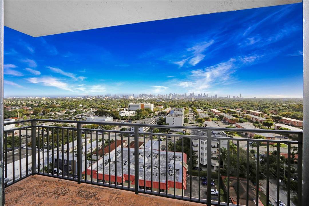 Bright, east facing 2 bedroom, 2 bath condo at Puerta de Palmas, 888 Douglas Road in Coral Gables, now competitively priced.