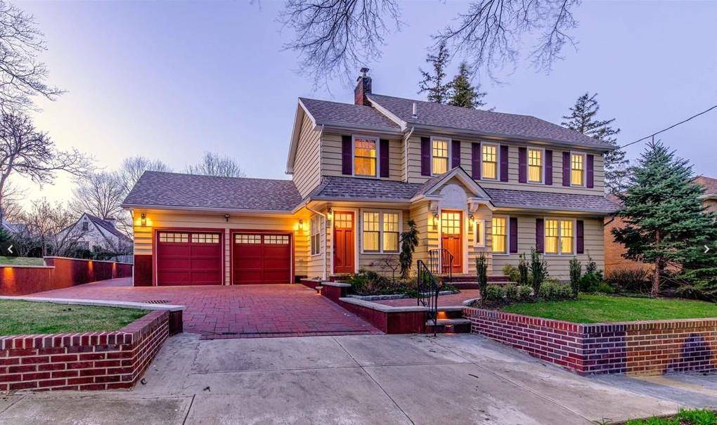 Stunning and completely renovated, this Colonial masterpiece is ideally located on a generous 100 x 100 lot in the heart of the NYC Douglas Manor Historic Landmark Community.