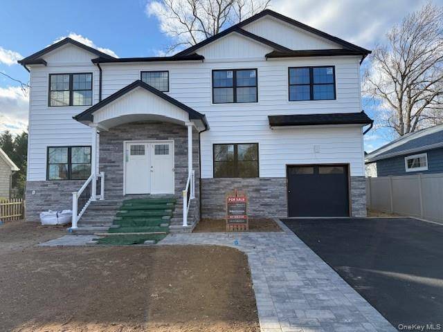 Wantagh Woods Brand new custom colonial being built with modern farmhouse style.
