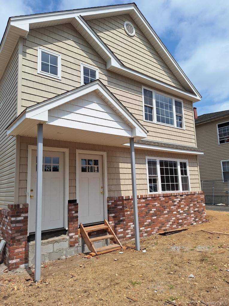 New Construction, beautiful town house with two bedrooms, on the second floor with wood floor and private shared full bathroom, ceramic tile floors, countertop granite, first floor Livingroom with wood ...