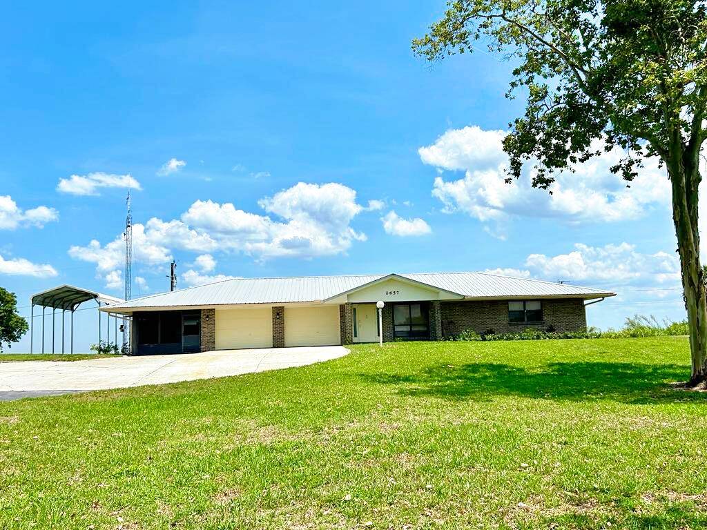 Fisherman's Paradise ! This stunning brick riverfront home on the Caloosahatchee River an intracoastal waterway offers the ultimate Florida lifestyle.