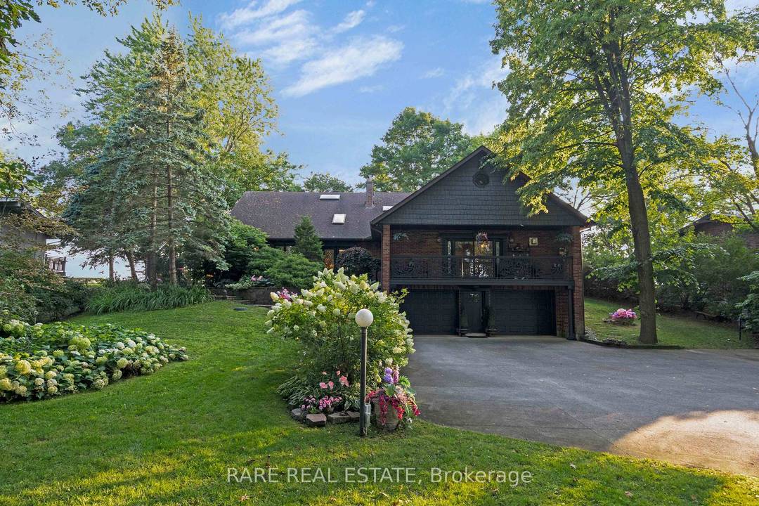 Welcome to 735 Lakeshore Road in Port Colborne, a rare and elegant waterfront estate with 101 feet of private beach on Lake Erie.