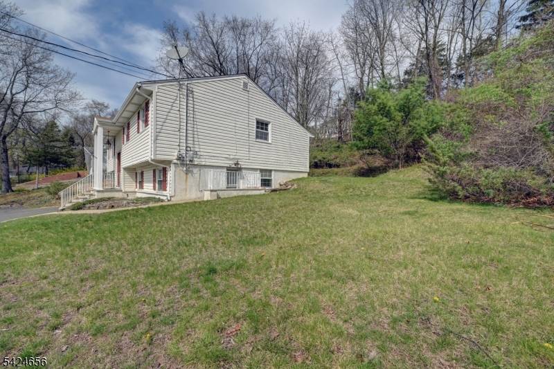 Welcome to this spacious and versatile 4 bedroom, 2 bath bi level home, perfectly situated with scenic views overlooking the fields of Farms View Farm.