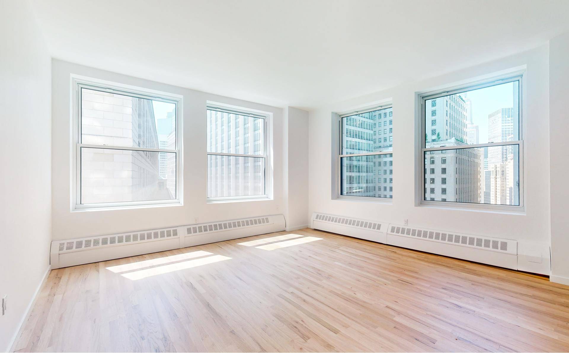 NEVER LIVED IN Brand New Renovated rare and airy corner Loft home is currently available at the legendary Liberty Tower.