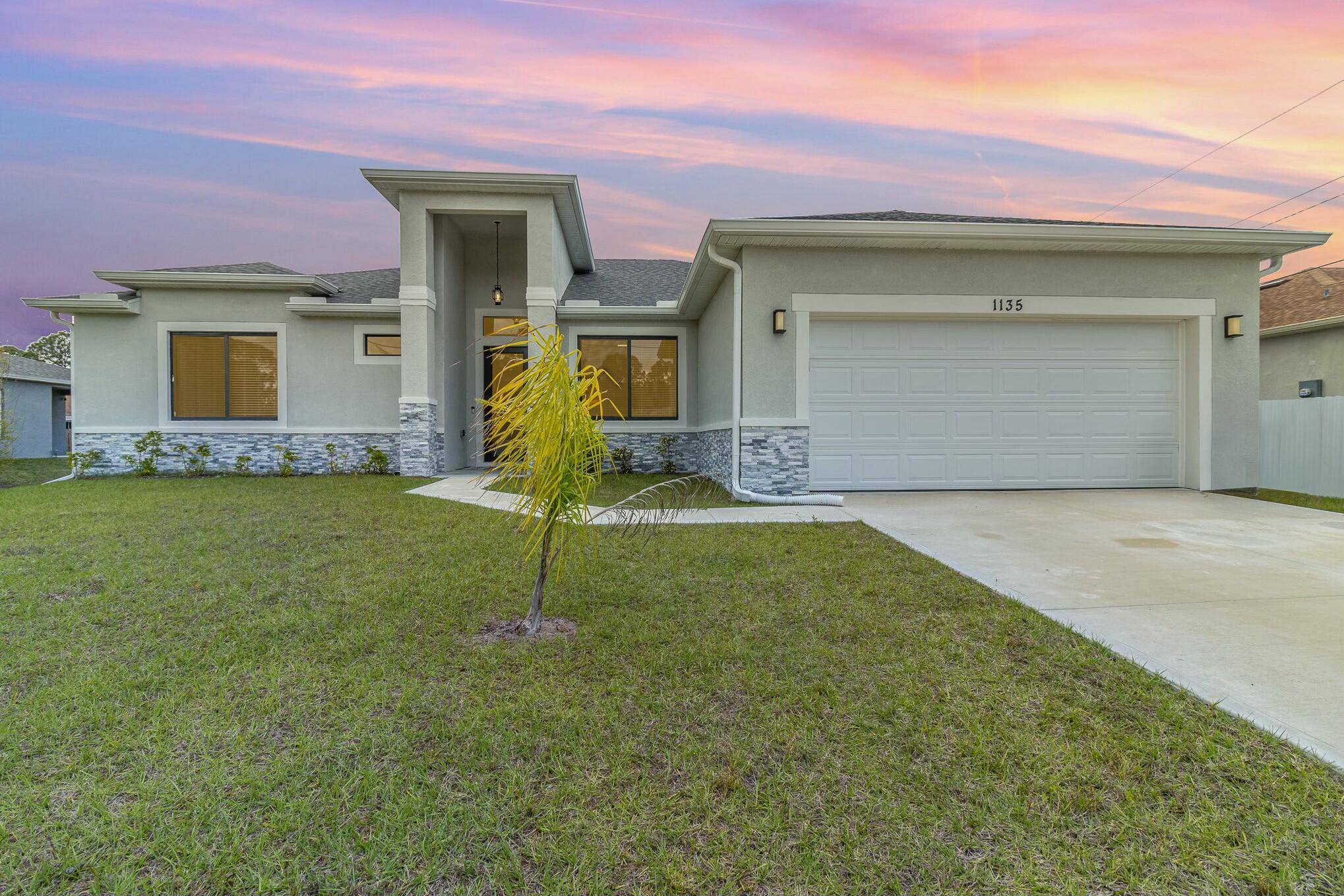 READY TO MOVE IN ! Step into modern luxury living in Palm Bay, conveniently located near shopping, dining, and more.