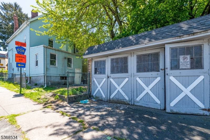 Corner lot 2 family with a detached garage plus 2 private parking spaces.