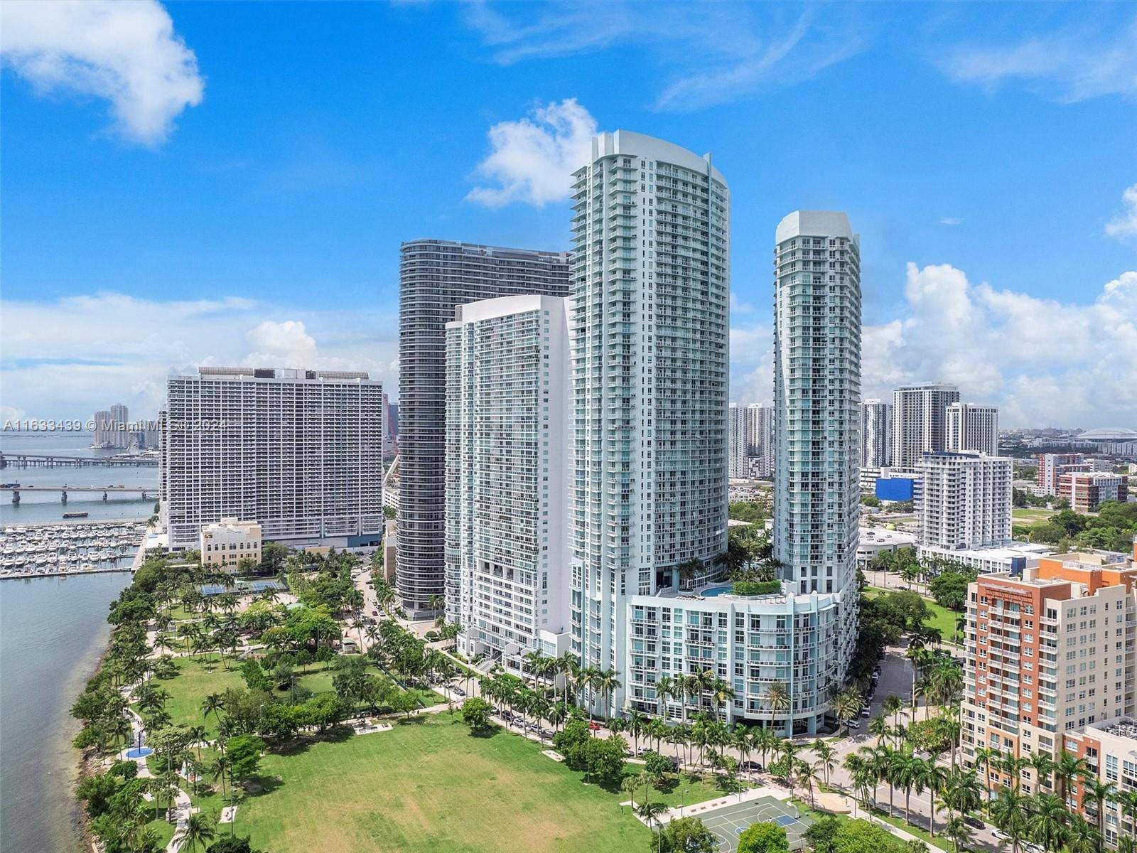 Discover this stunning condo with 16 ft ceilings and water views !