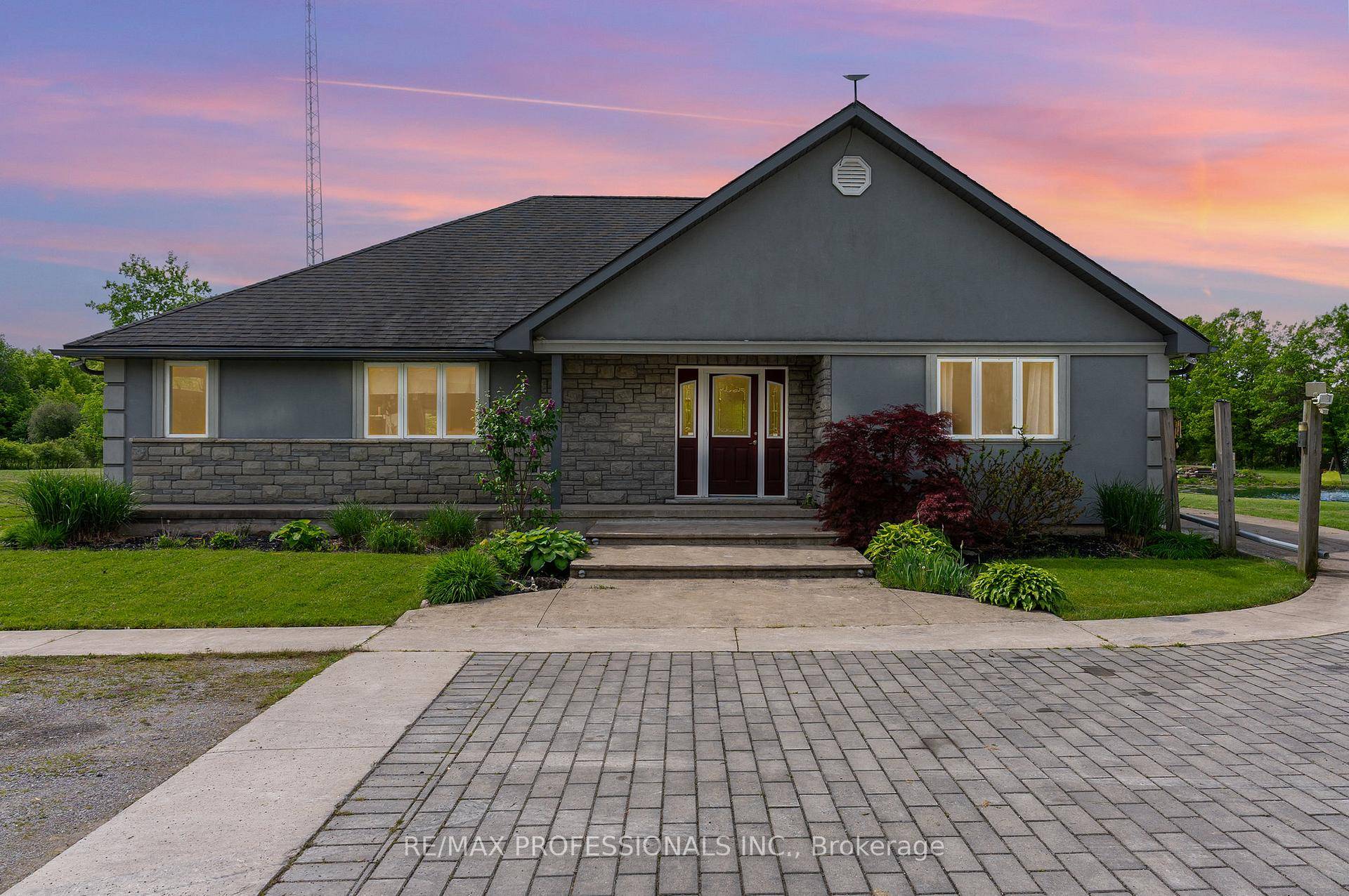Nestled just steps from the scenic Niagara River, this exceptional 12.