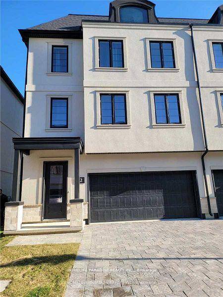 Absolutely Beautiful End Unit 3 Storey Townhome With An Open Concept Layout And Sun Filled, With Double Car Garage !