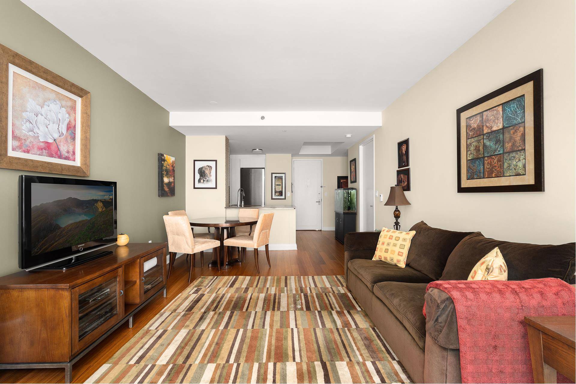 This beautiful and serene home offers 857 square feet of elegant, modern design in one of Tribeca's most coveted, boutique full service buildings.