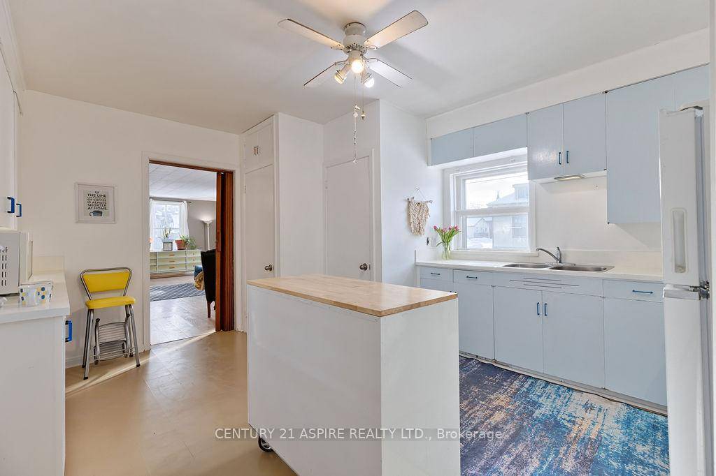 Check Out This Charming Two Story Red Brick Home !