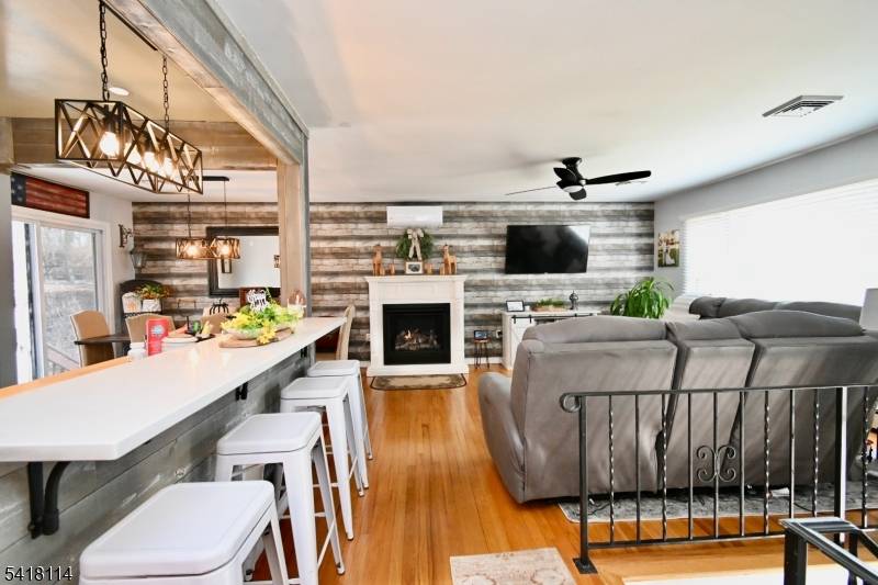 Welcome to this well maintained 3 bedroom, 2 full bath, 1 car garage bi level home nestled in the desirable Lake Swannanoa section of Jefferson Township.