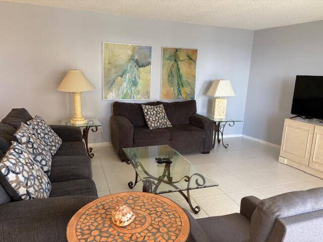 This apartment checks all the boxes, sunny SE exposure steps to the sand and short walk to shops and restaurants More perks are the wide beach and updated kitchen spend ...