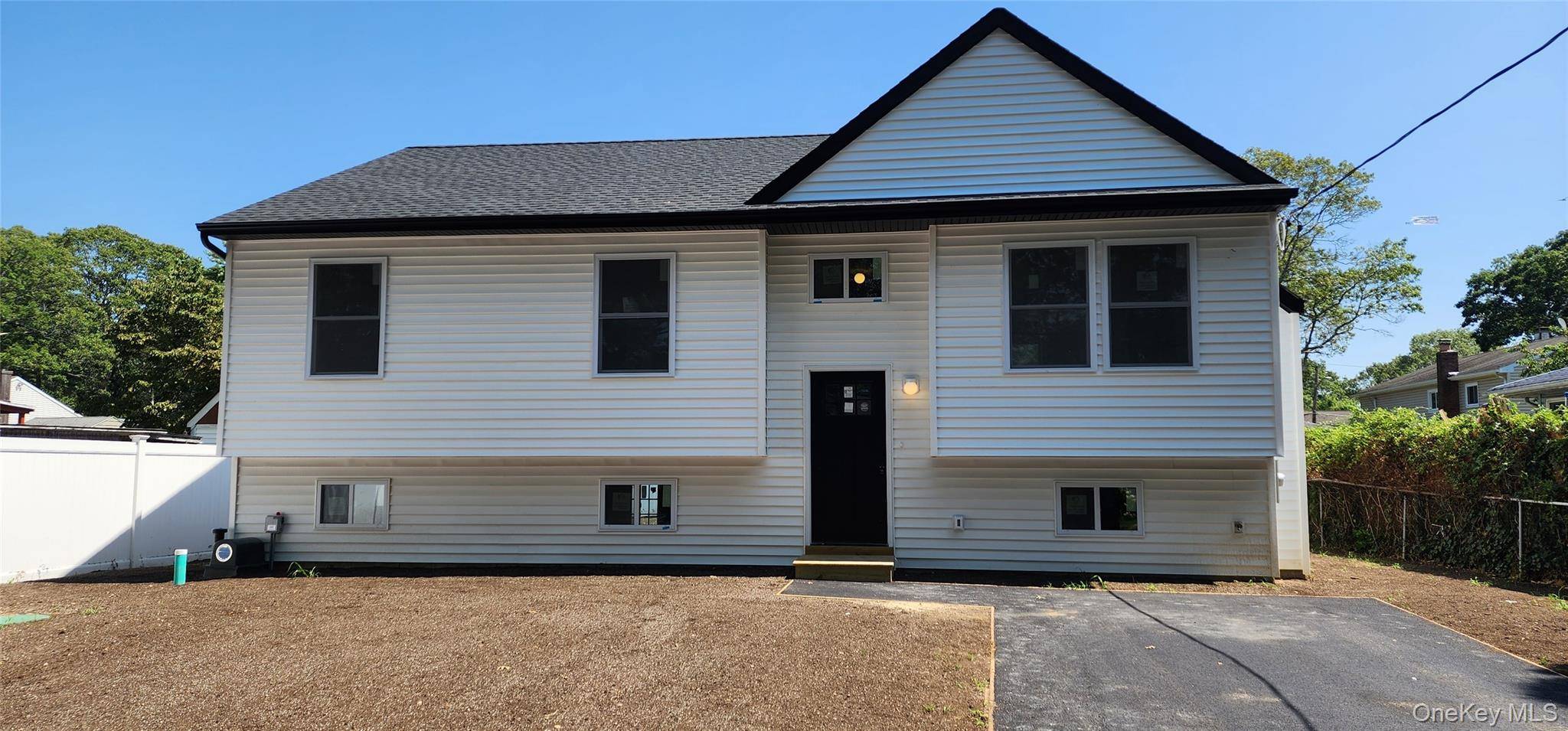 BRAND NEW RAISED RANCH ALMOST FINISHED ON NICE QUIET STREET IN MASTIC !