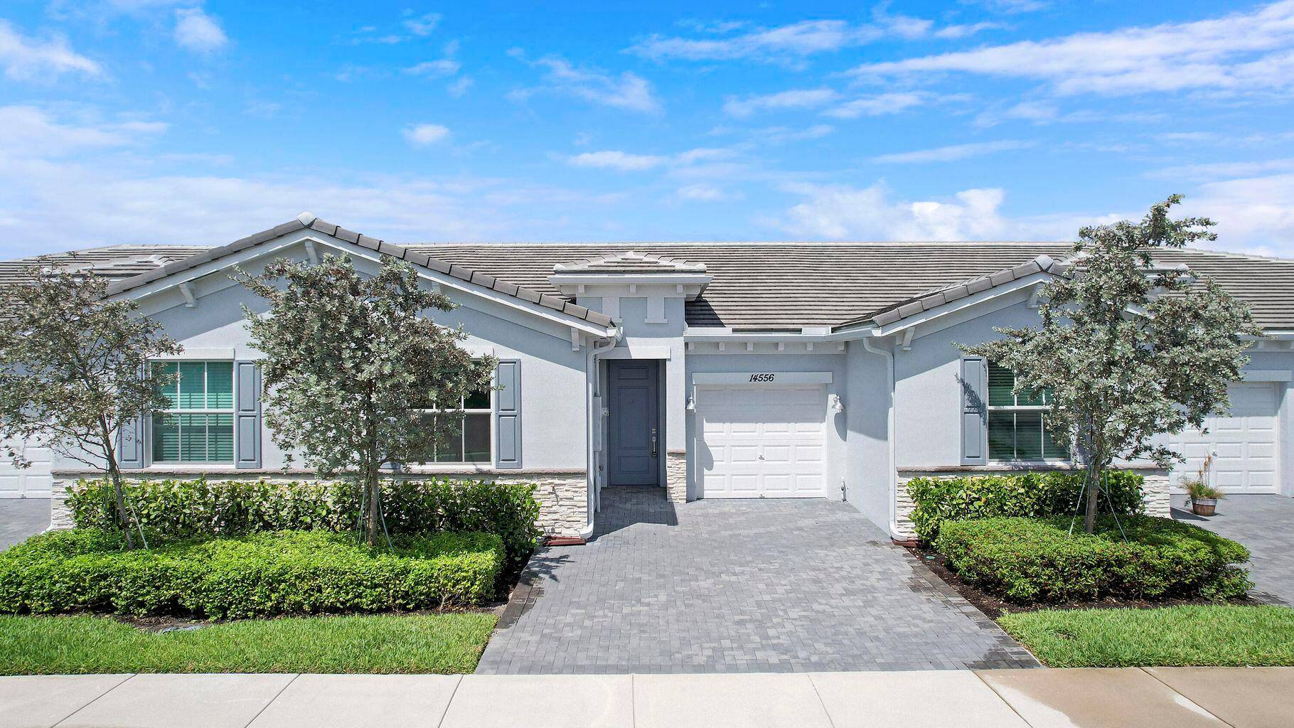 Welcome home to this beautifully maintained 2 bedroom, 2 bathroom villa in the highly sought after gated community of Avalon Trails, built in 2022.
