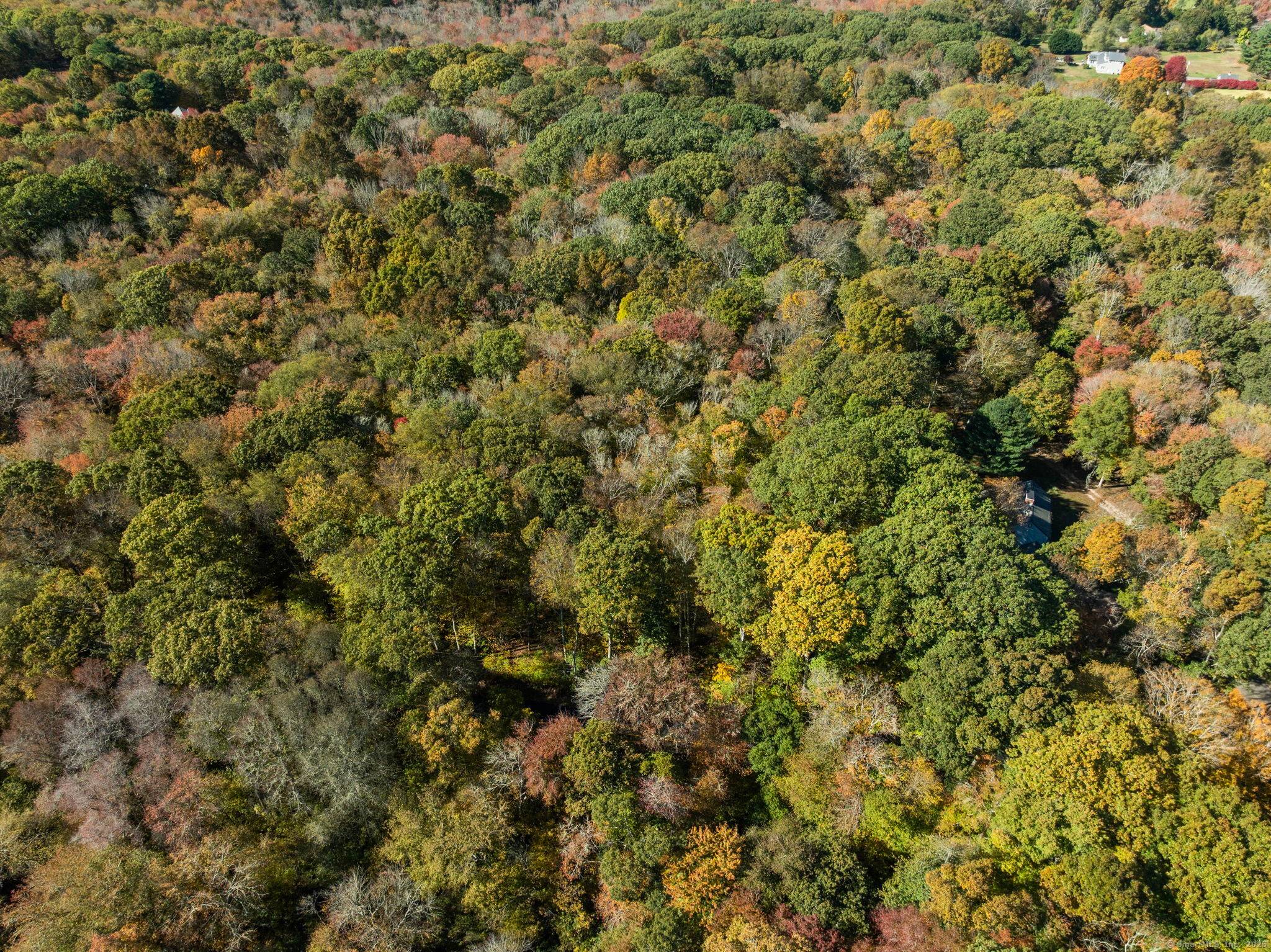 Discover an exceptional opportunity to own 8 acres of land in the highly sought after town of North Stonington.