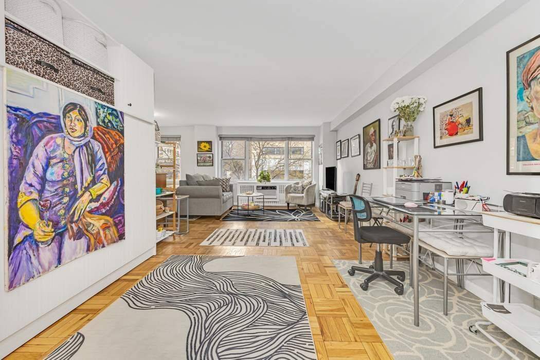 This freshly painted quiet alcove studio offers serene treetop views and an exceptionally low monthly maintenance of under 1, 000.