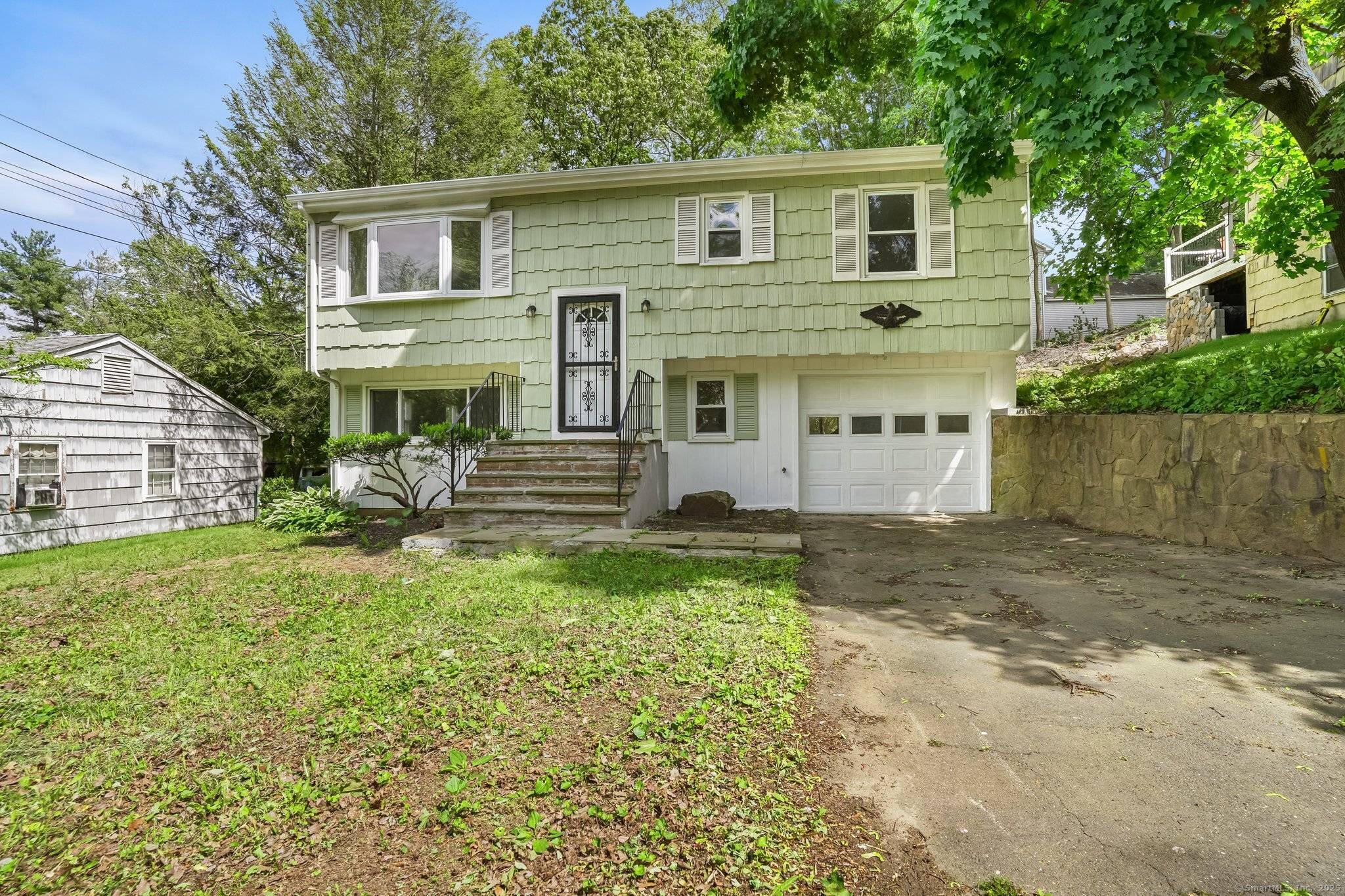 Remodeled raised ranch style home ideally located in the sought after West Norwalk market area.