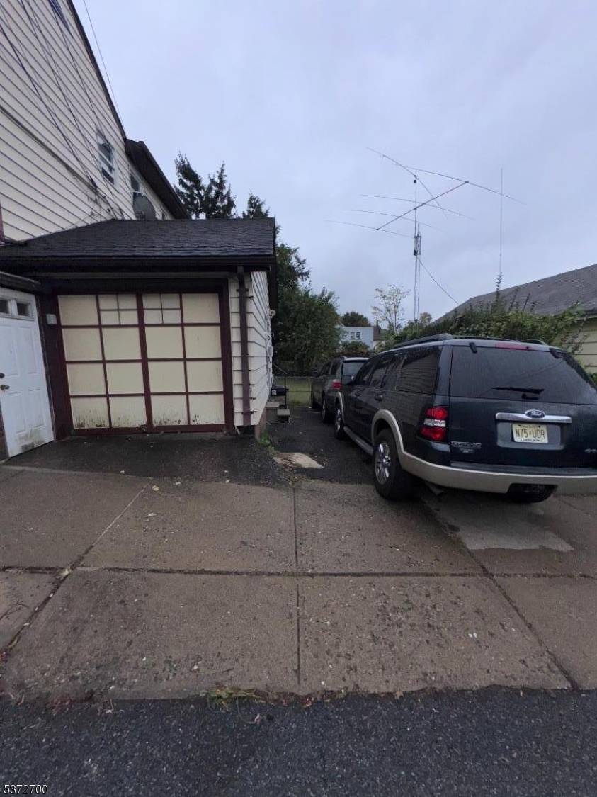 Sitting on a generous 75 x 100 lot, this versatile home offers 2 bedrooms on the first floor with potential for a third, living room, dining room and laundry room.