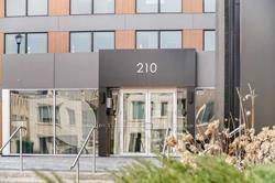 Stunning corner penthouse at Trafalgar Landing featuring furnished 2 bedrooms and 2 bathrooms with a bright open concept layout and floor to ceiling windows.