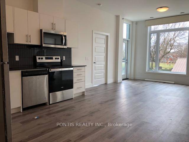 Experience stylish urban living in this luxurious 2 bedroom, 2 bath condo featuring 9 ft smooth ceilings, modern vinyl flooring, and a bright open concept layout with oversized windows.