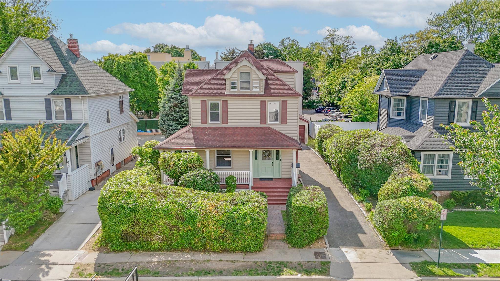 This classic colonial home with a wrap around porch is full of potential and ready for your personal touch.