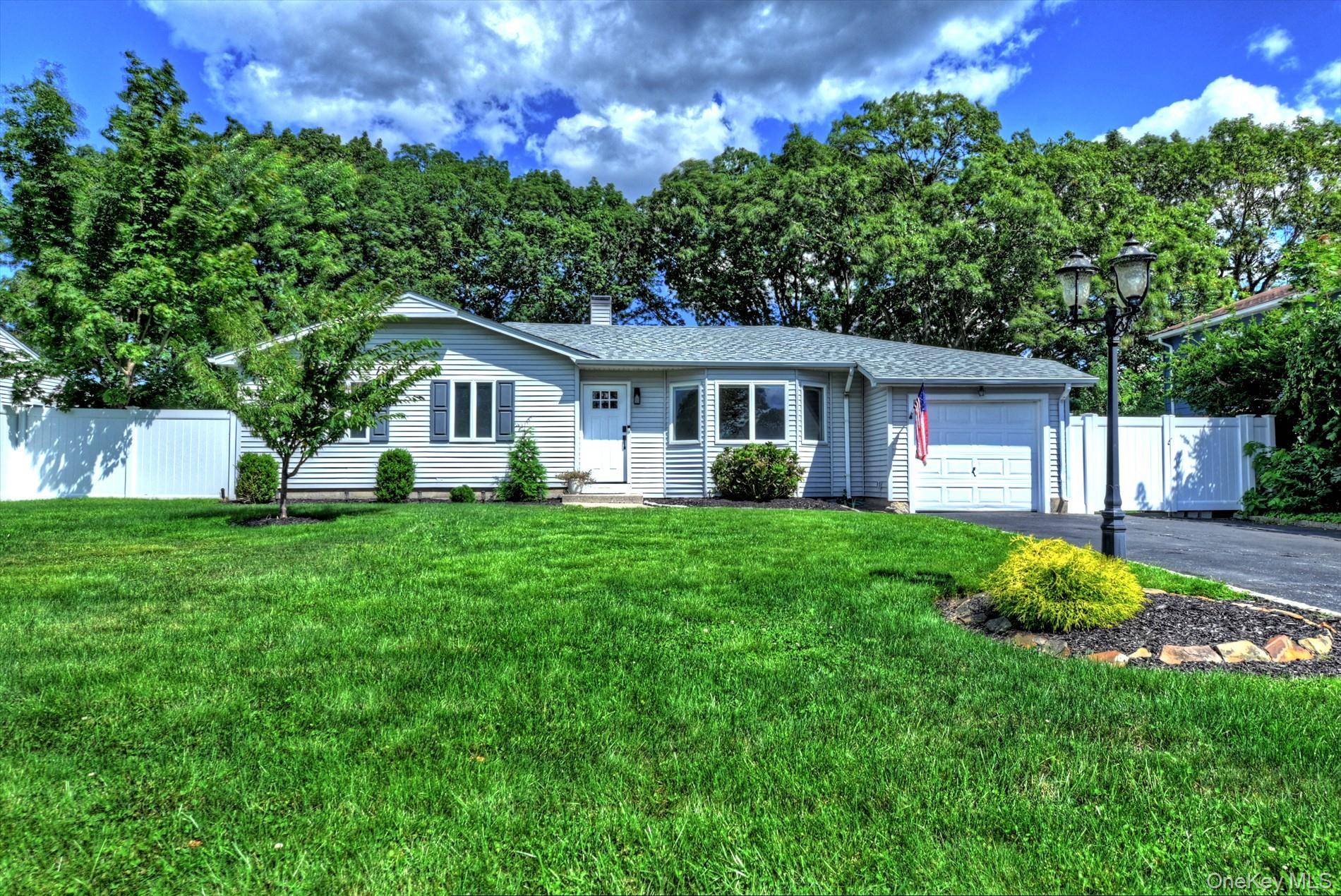 Welcome to this stunning ranch style home in Birchwood Estates, located within the Sachem School District.