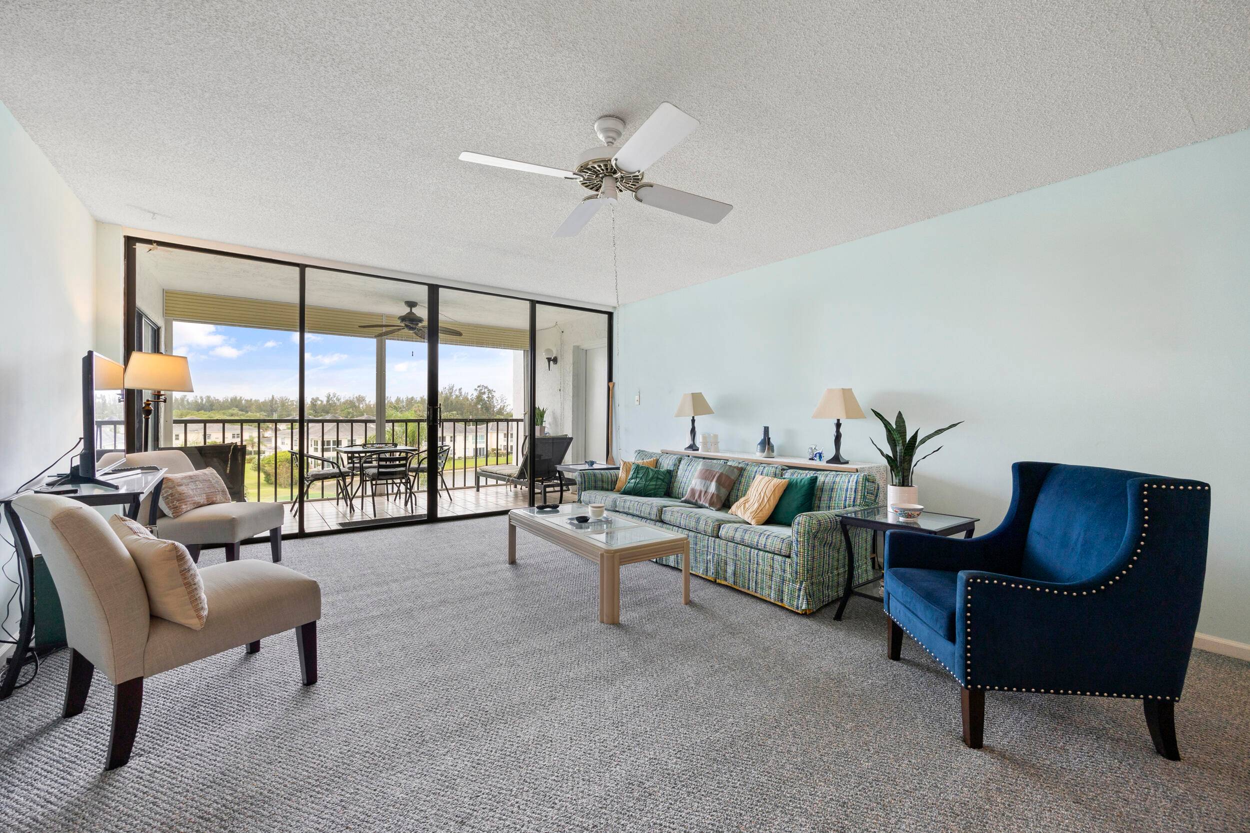European minimalistic, uncluttered decor in this charming 2 bedroom, 2 bathroom condo nestled in the Catamaran II section of Ocean Village, overlooking the picturesque golf course.
