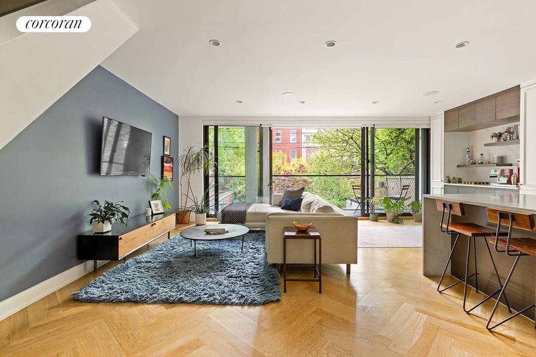 An alluring, recently constructed, 3 bedroom, 3 bathroom, 1, 719 SF duplex with outdoor space in a boutique condo awaits you in the heart of Greenpoint.