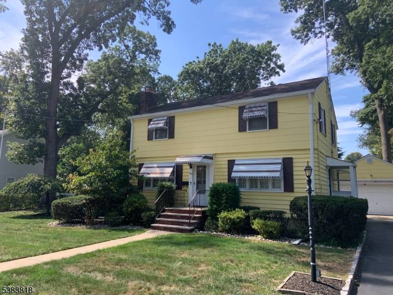 Unique opportunity to own this 2 family home duplex style featuring a spacious yard with outbuildings and two car detached garage.