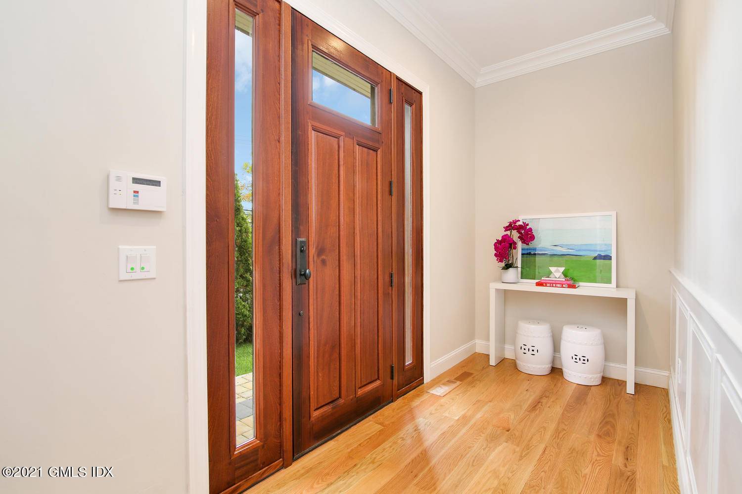 Luxurious, new construction four bedroom 3, 525 square foot townhome boasts stone patio, landscaped yard and attached two car garage convenient to schools, shopping and trains.