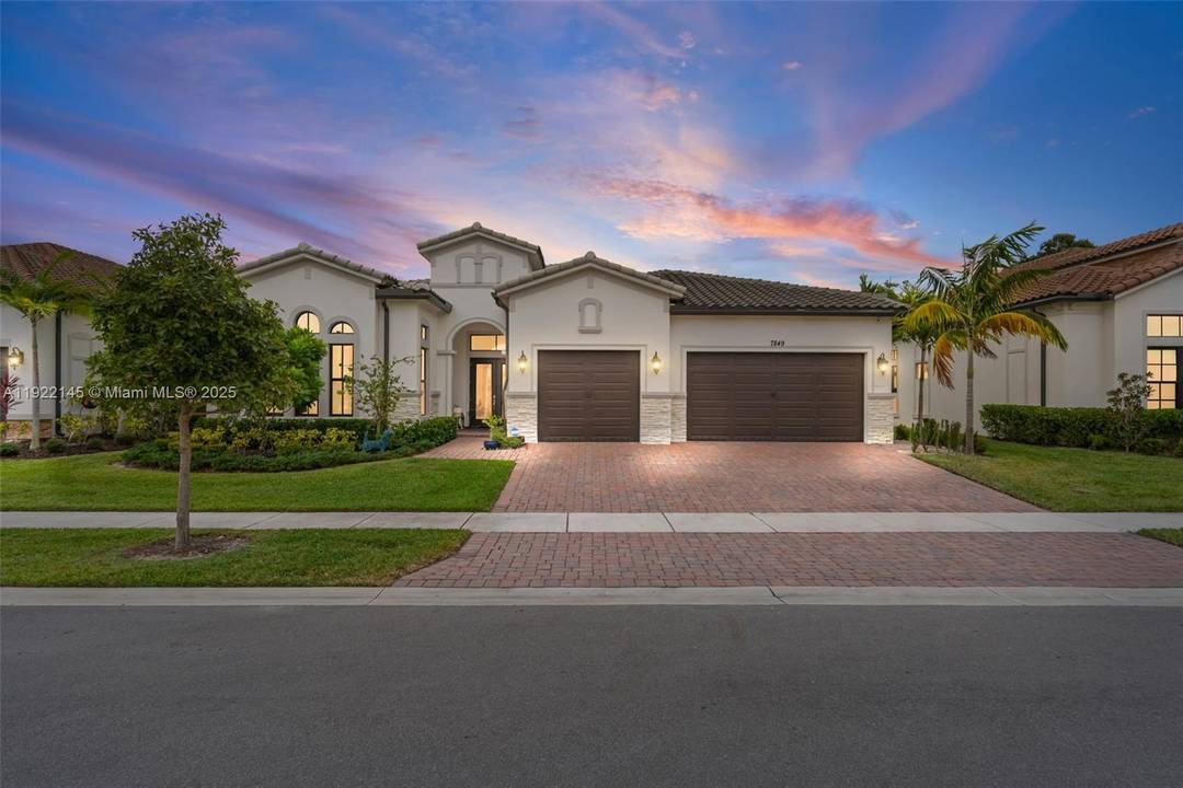 This stunning Home is located in the exclusive resort style community of The Falls at Parkland.