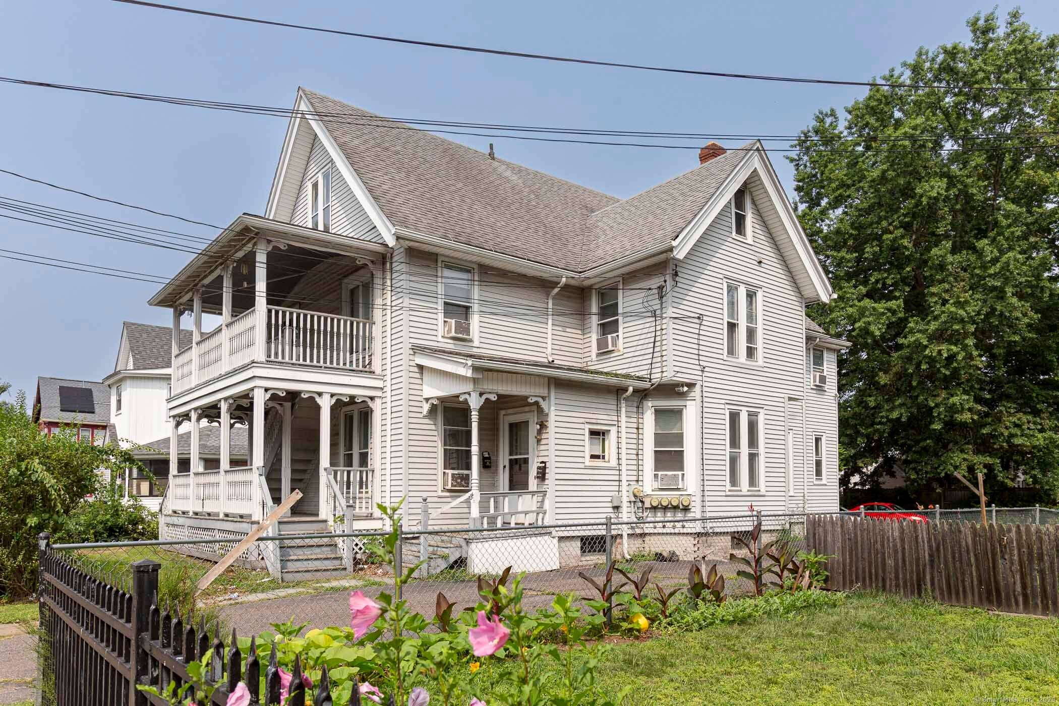 Well maintained 4 family house with plenty of off street parking.