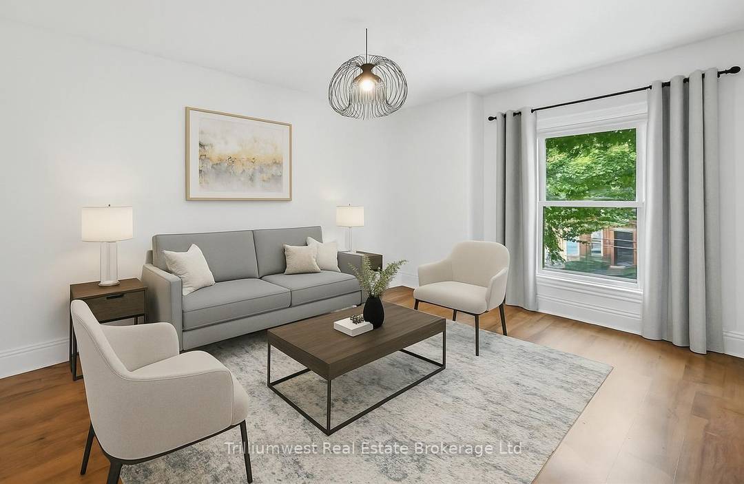 LEGAL DUPLEX ! Nestled on a quiet, tree lined street in Hamilton's up and coming neighbourhood, this stately 2 storey red brick home blends historic charm with modern day functionality.