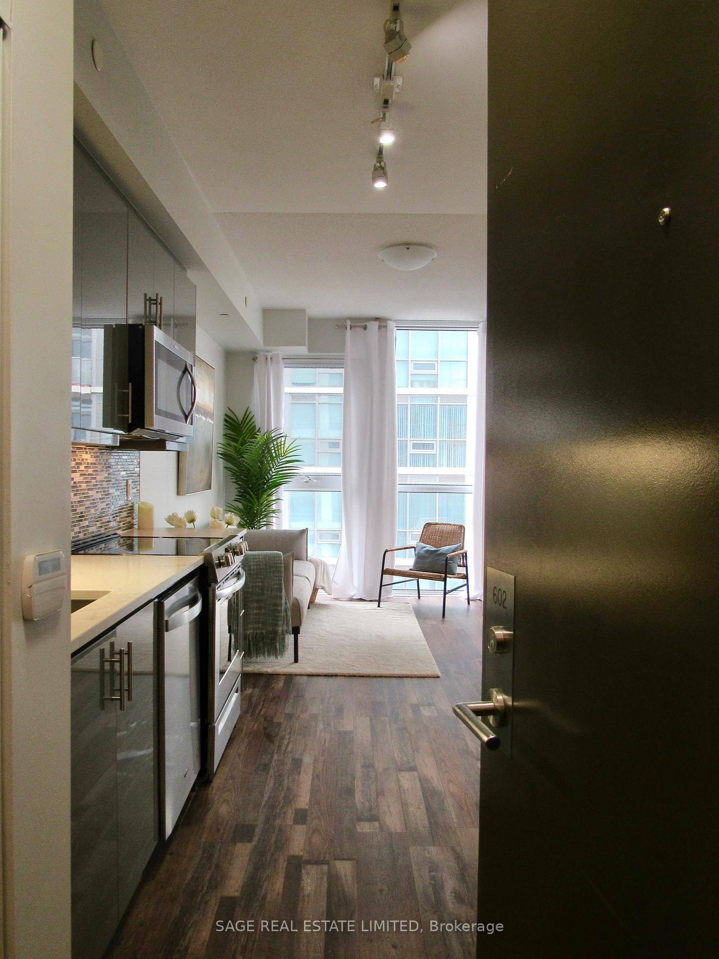 Step into this sun filled, freshly upgraded suite featuring new flooring and modern white dove paint that gives the space a fresh, contemporary feel.