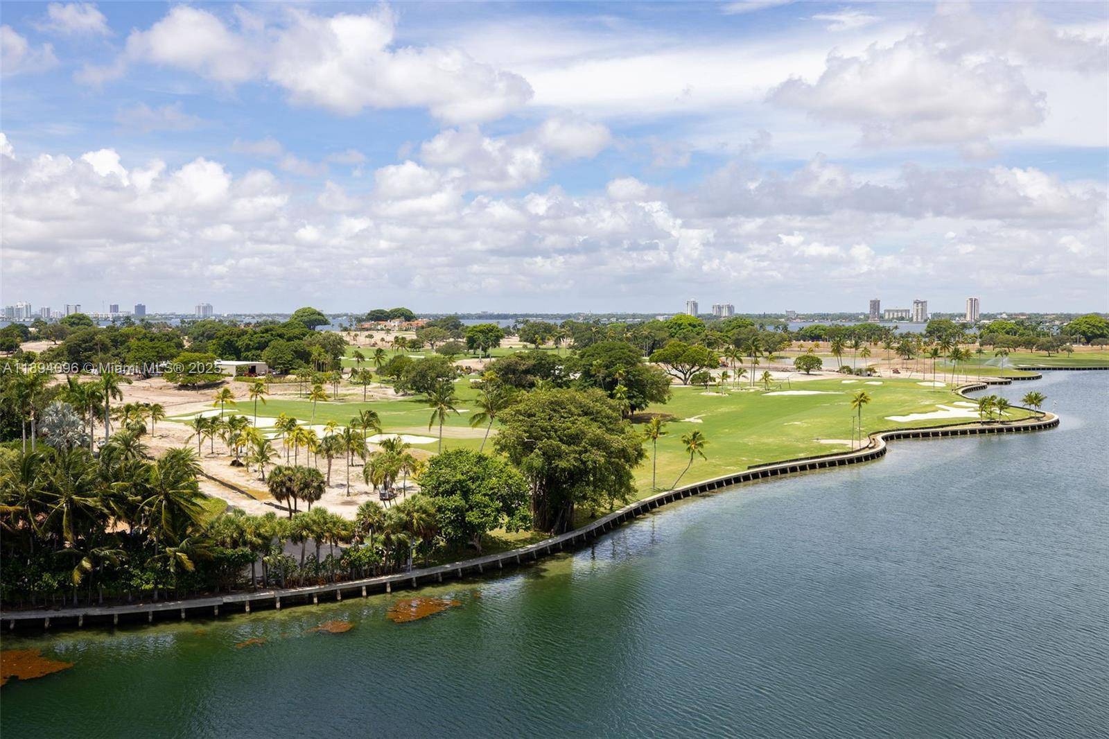 Direct 10th FL waterfront Biscayne Bay and Indian Creek Isle views from spacious 1BR Den 2Ba residence on the southernmost point of Bay Harbor Islands.