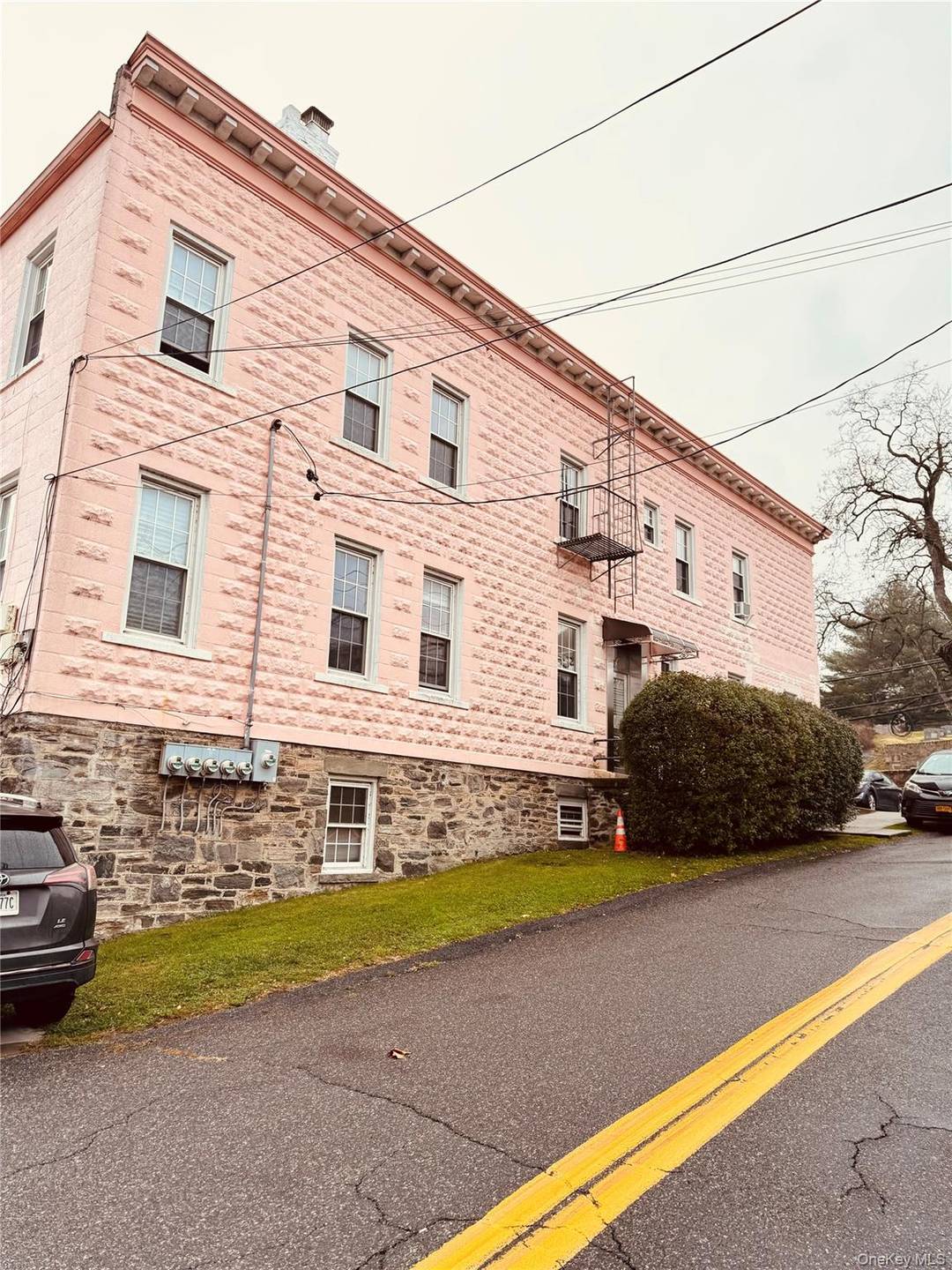 Great investment opportunity corner multifamily offers five units two 2 bedroom apartments on the first floor, three 1 bedroom units upstairs, plus a basement 1 bedroom.