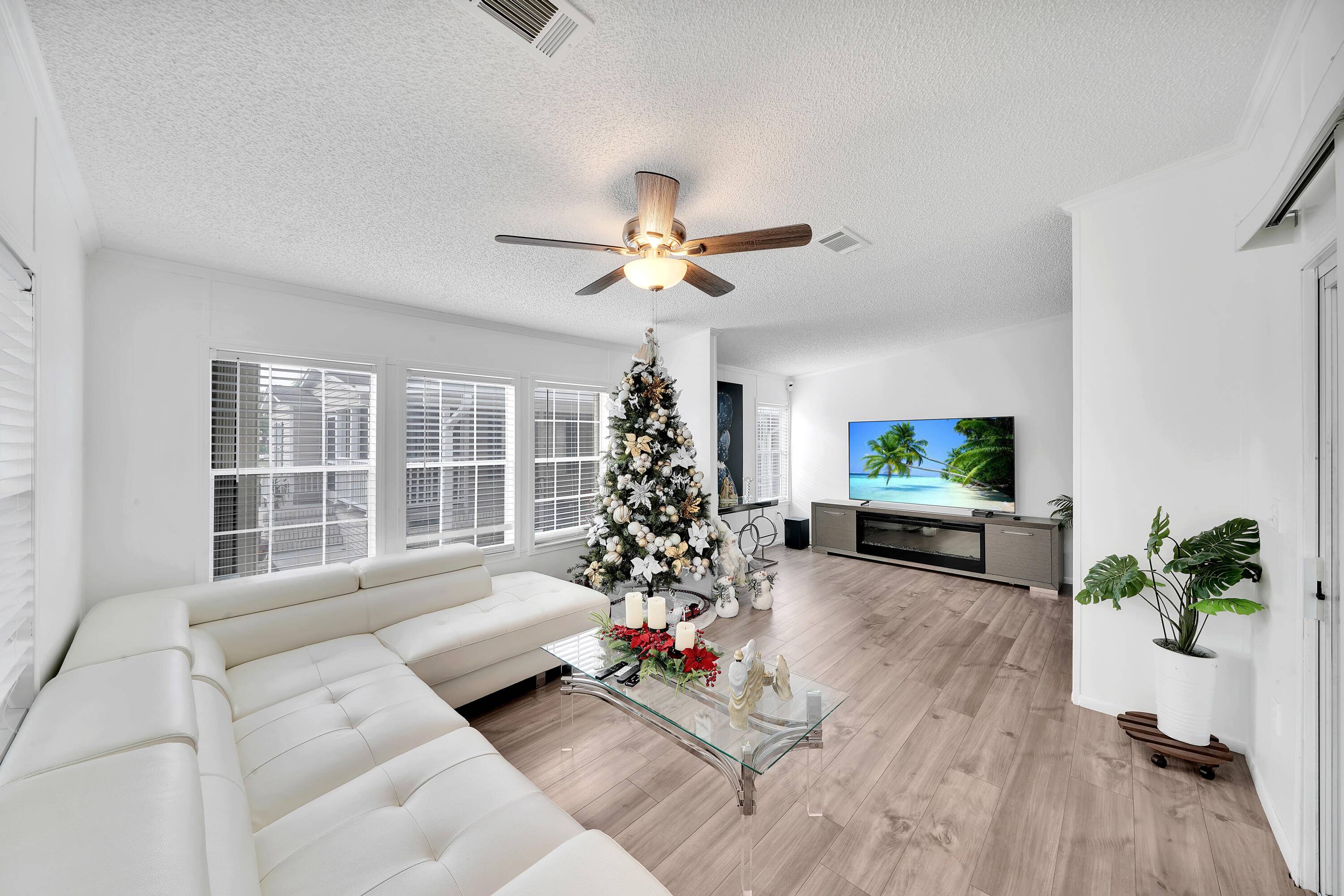 Welcome to this delightful 2005 built manufactured double wide home nestled in the sought after Garden Walk community !