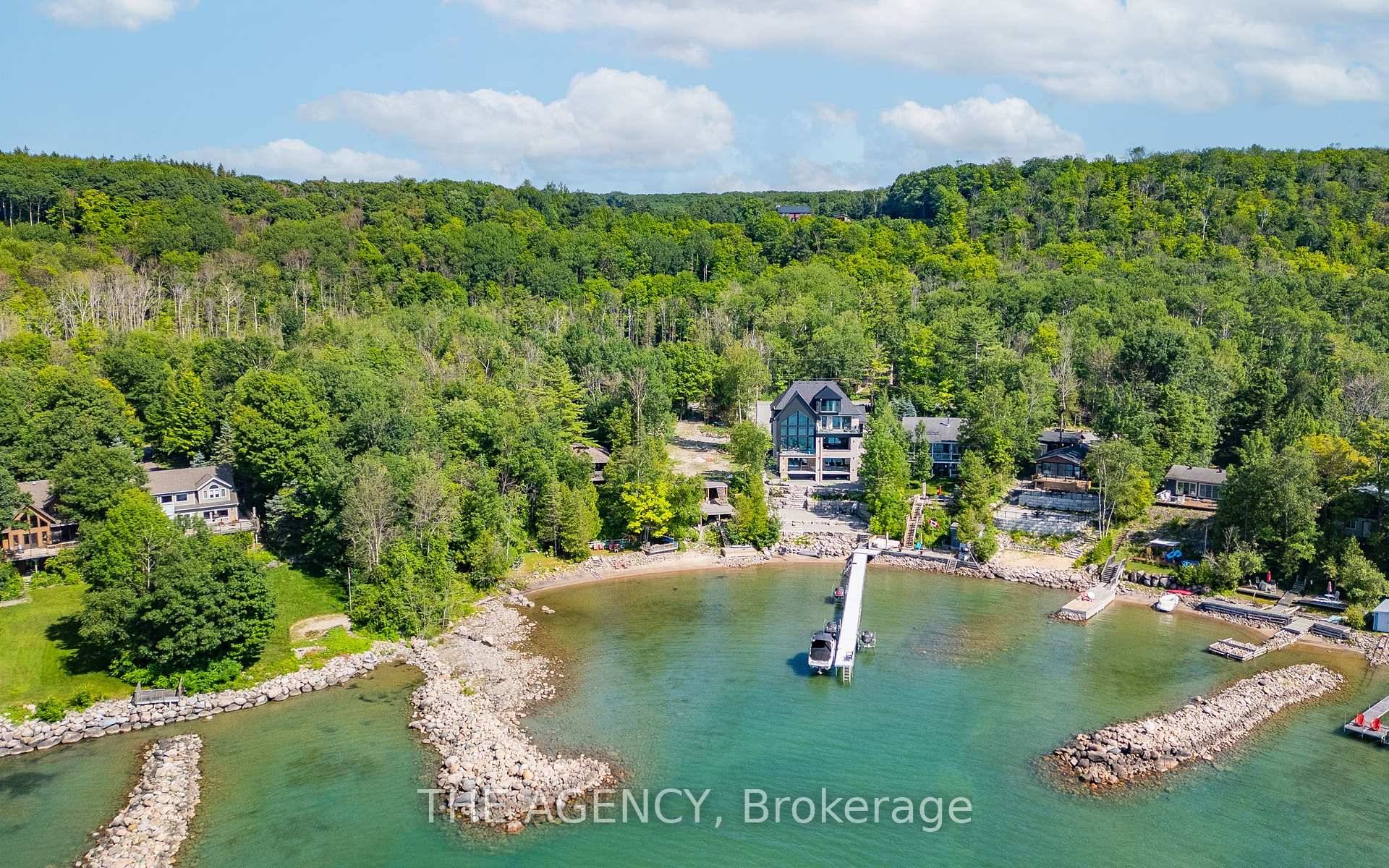 Welcome to an incredibly rare, shovel to the ground ready opportunity to build your dream home right on the crystal clear shores of Georgian Bay.