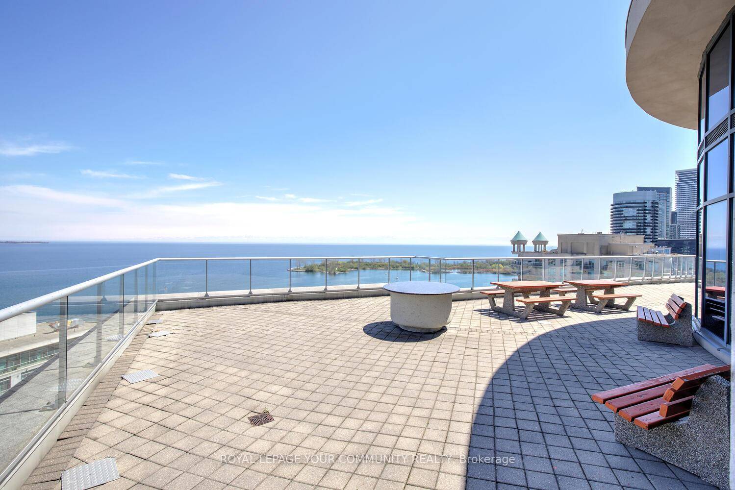 Live above it all stylish 9th floor condo with city views amp ; a glimpse of the lake !