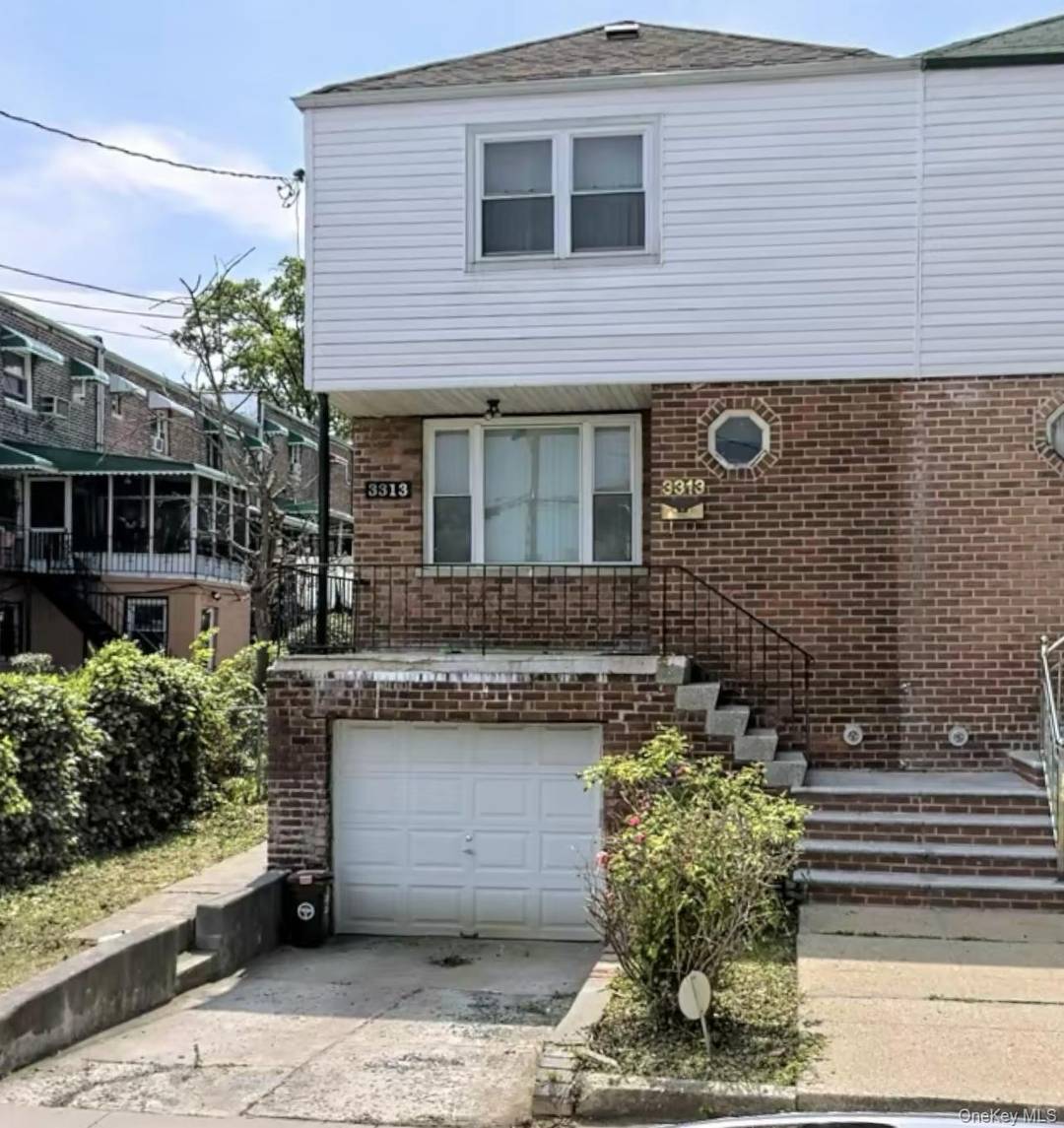Spacious 3 bedroom, 2 bath single family home for sale in the Williamsbridge section of the Bronx, featuring garage parking and an unfinished basement with excellent potential.